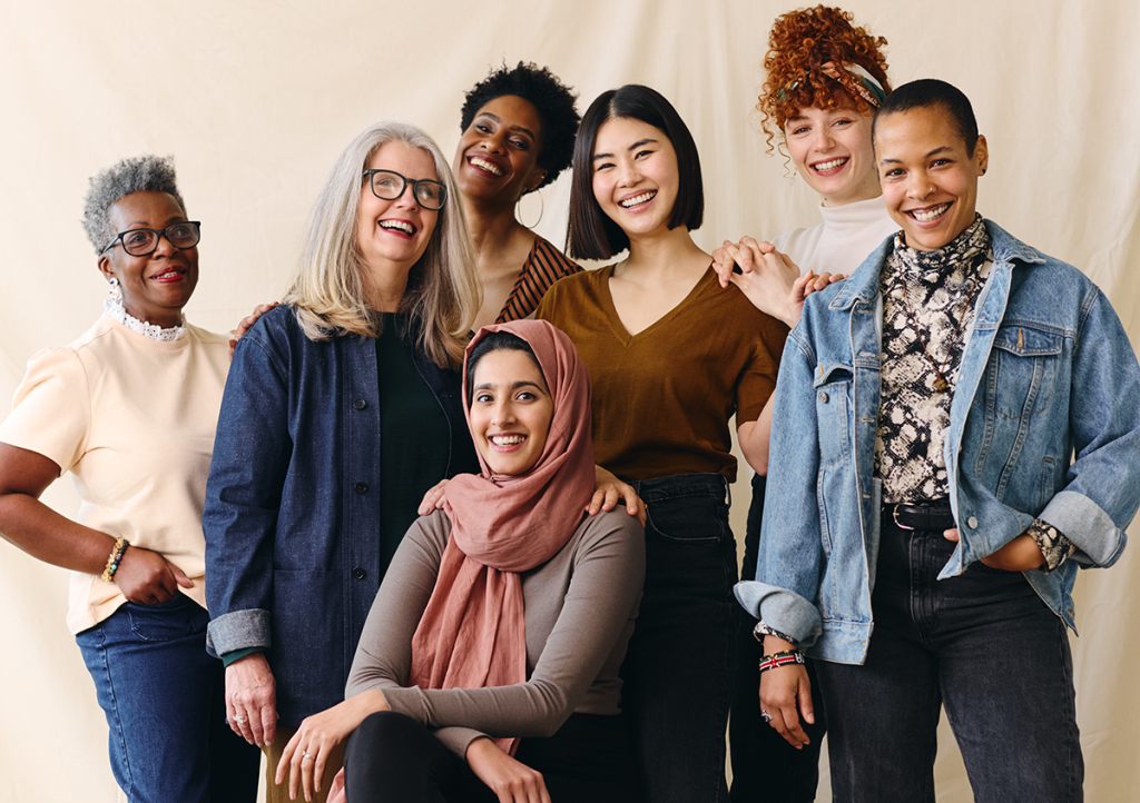 Portrait of mixed age range multi ethnic women smiling